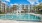 resort style pool with sunshelf and lounge chairs J Ardin Apopka FL luxury apartments for rent  