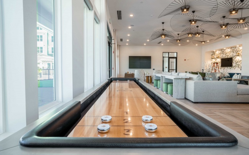 shuffleboard table and seating  J Ardin Apopka FL luxury apartments for rent 