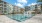 resort style pool with sunshelf and lounge chairs J Ardin Apopka FL luxury apartments for rent  