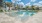 resort style pool with sunshelf and lounge chairs J Ardin Apopka FL luxury apartments for rent  